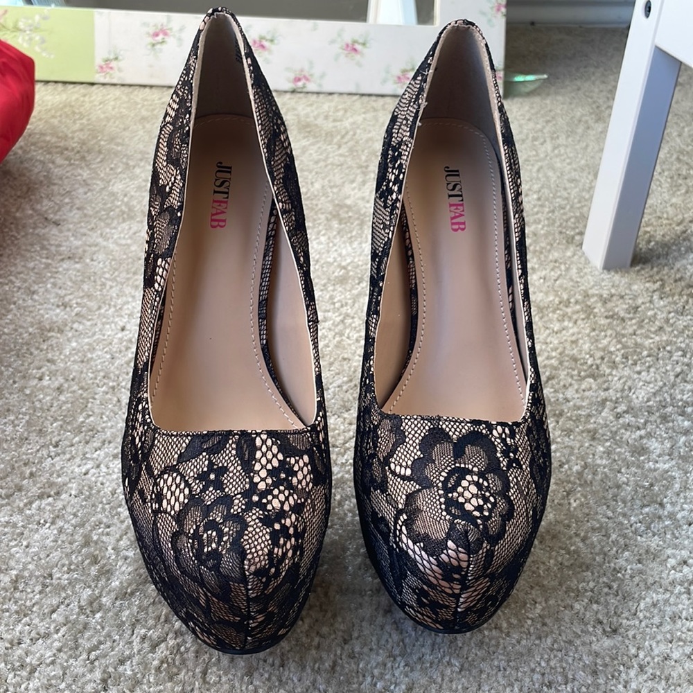 Lace platform heels. Pretty much never worn, just tried on.
